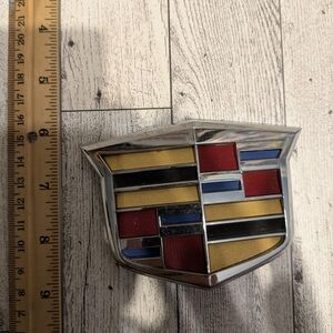 Cadillac Emblem with Red, Yellow, and Black Accents